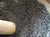 Grinding sesame in a suribachi 3 Grinding sesame in a suribachi 3
