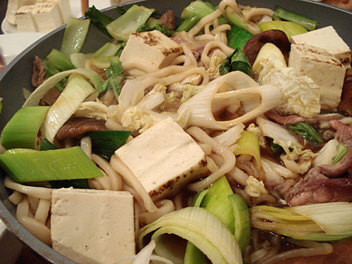 Sukiyaki: Japanese hot pot with beef, tofu, rice noodles and vegetables